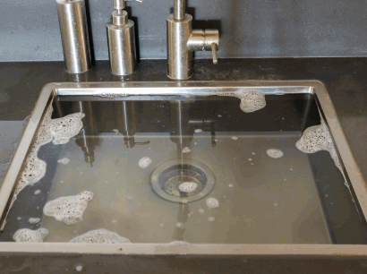 slow draining sink